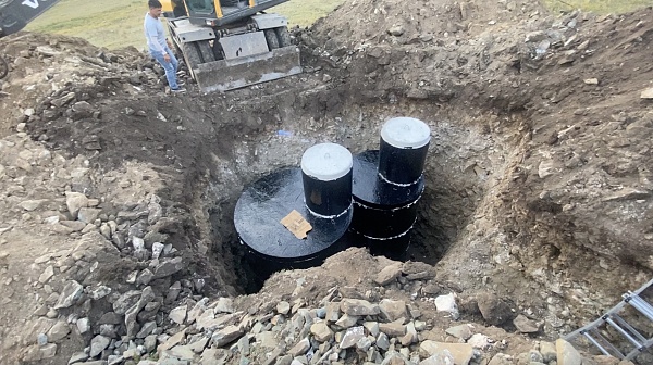 Click image for larger version

Name:	finished septic tanks visible in ground.jpg
Views:	140
Size:	1.72 MB
ID:	1364