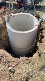 Toilet septic tank being lowered.jpg