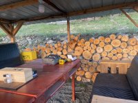 logs under patio cover.jpeg