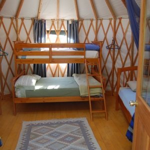 Cozy 16' yurt at Spirit Vision Retreat Center.