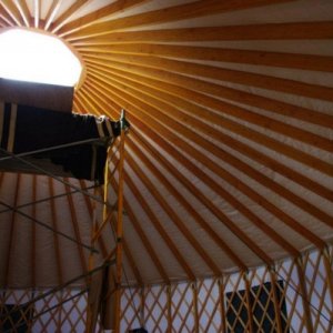 Yurt inside with scaffolding.