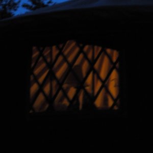 Pic of the yurt from outside at night.