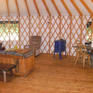 The "living room" at the yurt with the new stove.