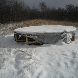 I had hoped to beat the snow, but I didn't quit make it.  I put the deck about 2 feet off the ground to keep it above the snow. (we'll see if that was