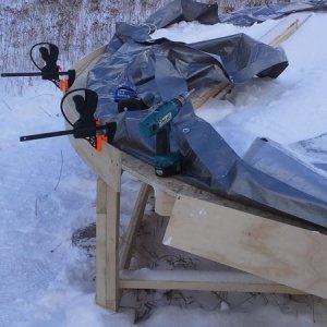I used clamps as a jig, they helped keep my edges even around the yurt.