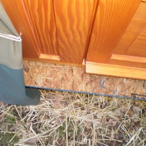Faux pas! Platform sticks out past the door--good way to get water-saturated OSB. With some time, freezing, warmth it may auto-regulate to flush with 