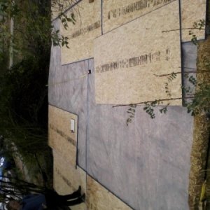 square yurt platform build. Bales, plastic sheeting, OSB. Water got under & over plastic, caused bales to mold. Ewe!