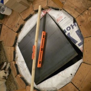 Steel sheet on top of cinder blocks but under concrete for distributing load.