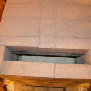 Air gap. I finally got a grout sponge for cleaning up the smeared refractory mortar.

Next level is the heat exchange channel/bell.