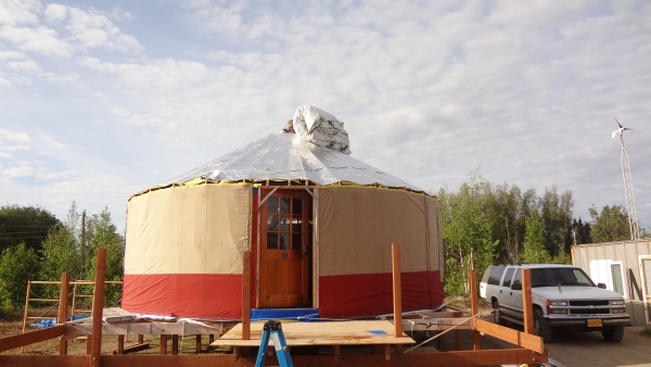2 inch arctic insulation blanket being placed.