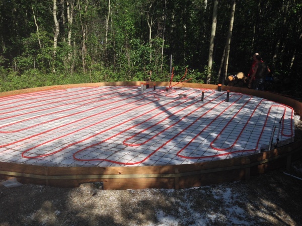 28' circle, gravel base, 4 inch rigid insulation, 2 circuits of PEX line for in floor heating