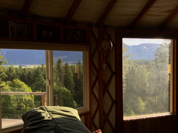 a peak through two of the five windows facing the valley