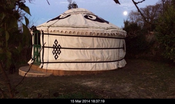 A view of the Yurt at night time in the moonlight (shortly after this photo we had to take the Yurt down again as it was not put up correctly (note th