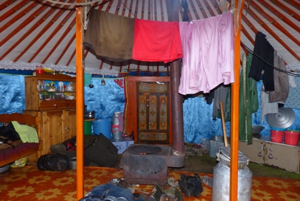 After 6 hours on horseback in the rain to get here, we were very happy to have a fire and a warm yurt to dry out in. Y3