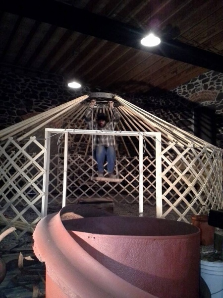 After a few modifications!  I welded five sockets onto the ring and slid the roof poles in.  After adding most of the remaining poles and tightening t