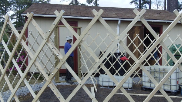 Attaching the kahna to the door frames...