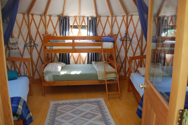 Cozy 16' yurt at Spirit Vision Retreat Center.