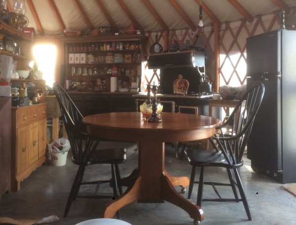 Dining area, soon to have black metal pendant light fixture. Electric & candle.