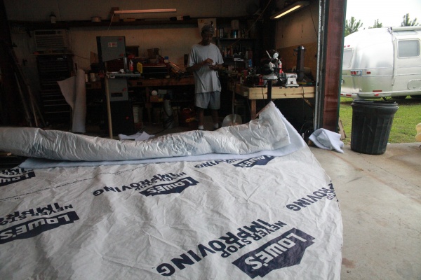 I had help making the 1.5 " polyester blanket insulation for the Yurt roof.