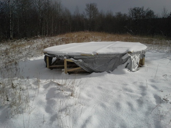 I had hoped to beat the snow, but I didn't quit make it.  I put the deck about 2 feet off the ground to keep it above the snow. (we'll see if that was