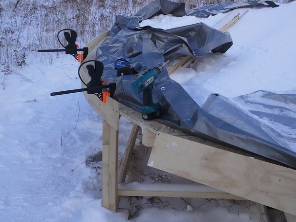 I used clamps as a jig, they helped keep my edges even around the yurt.