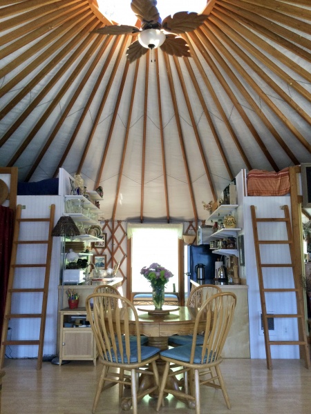 ladders to two sleeping lofts and galley kitchen