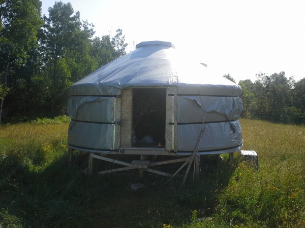 One-man tear down begins (I tore the yurt down and relocated it across my property, alone, to prove a point).