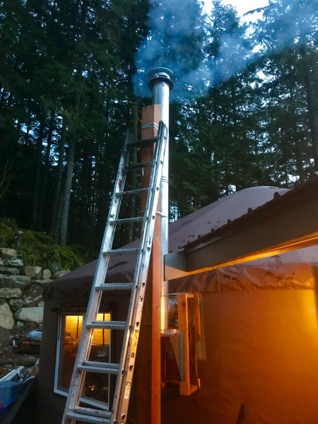 Our chimney goes through the wall and up. The wood stove was $1,000, the venting and set up was over $2,000!
