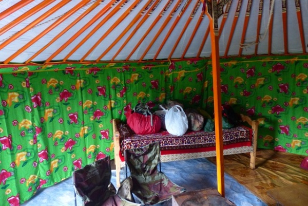 Our packs and food on the bed.  The floor was still damp from being mopped. Y4