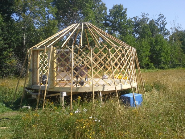 Removing the roof poles.