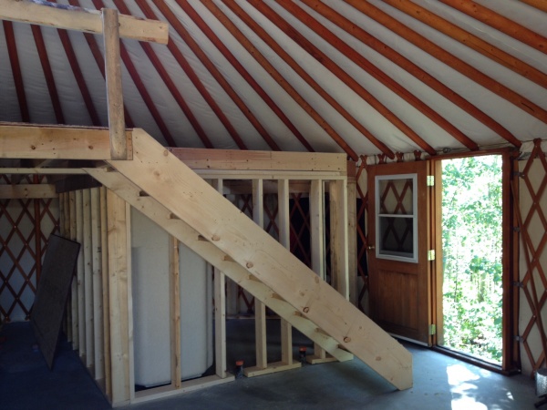 Stairs to loft, bathroom behind