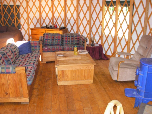 The "living room" at the yurt with the new stove.