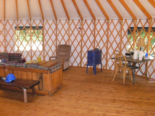 The "living room" at the yurt with the new stove.