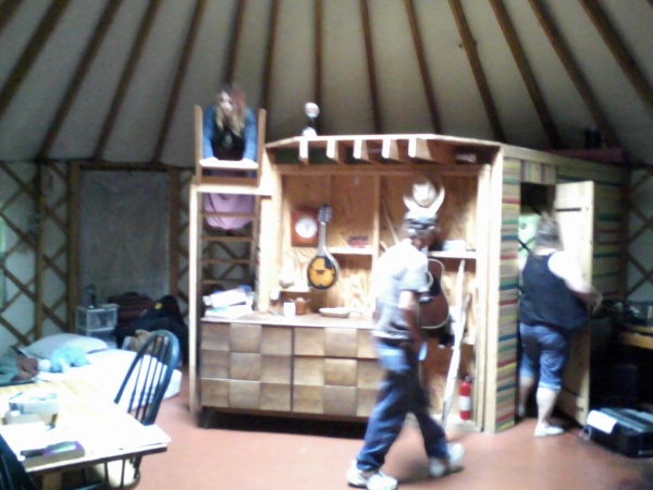 The loft on top of an enclosed fully functioning bathroom.