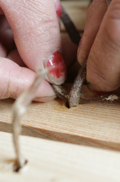 Tying camel sinew to hold walls together