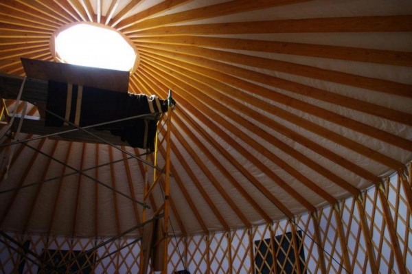 Yurt inside with scaffolding.