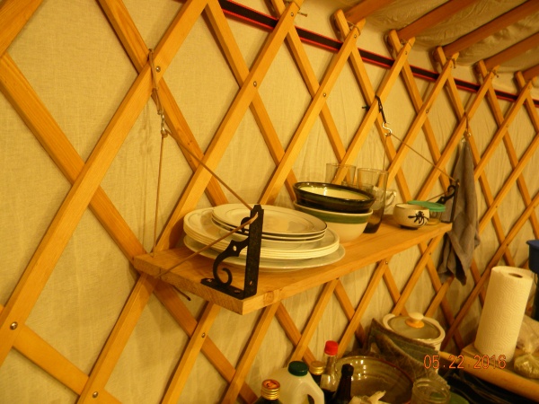 Yurt shelf! Bracket not necessary but I was trying it out so it's there for now.