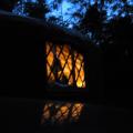Pic of the yurt from outside at night.  The reflection is the top of my truck.