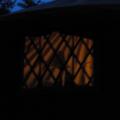 Pic of the yurt from outside at night.