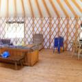 The "living room" at the yurt with the new stove.