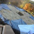 Tarp tied up onto the top of bales. Tyvek wrapped over & taped to the tarp.
