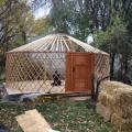 Squarish platform with yurt frame.