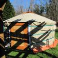 The front view of our Ger with out the crown cover in place, and the ground skirt not tucked in. This was a trial set up before taking off camping.