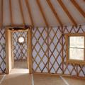 View through the hallway into the twelve foot Yurt. The smaller Yurt will be the bathroom, water heater, and electrical distribution.
