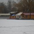 Completed yurt floating on a frozen river.