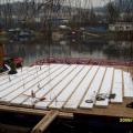 Platform joists and insulation are added for the yurt platform.