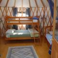 Cozy 16' yurt at Spirit Vision Retreat Center.