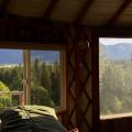 a peak through two of the five windows facing the valley