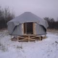 My little bother is nearly 7 feet tall and he was instrumental in getting the cover up over the top of the yurt.